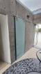 Puerta colgante en acero inoxidable